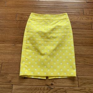Yellow  Ann Taylor skirt with white polka dots.